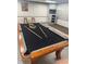 Game room with beautiful pool table at 955 Eudora St # 505E, Denver, CO 80220