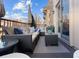 Charming balcony featuring comfortable seating, elegant cushions, and a relaxing atmosphere for outdoor enjoyment at 150 S Madison St # 303, Denver, CO 80209