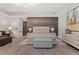 Serene bedroom with textured wall, modern lighting, and neutral tones for a calming atmosphere at 150 S Madison St # 303, Denver, CO 80209