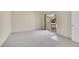 Spacious bedroom with plush carpeting and a sliding glass door to the patio at 11247 Wyandot St, Denver, CO 80234