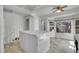 Bright breakfast nook off of kitchen featuring tile floor, windows and outdoor access at 11247 Wyandot St, Denver, CO 80234