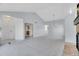 Spacious living room with light walls and access to dining area at 11247 Wyandot St, Denver, CO 80234