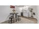 Basement bar area with wet bar and seating at 16930 E Wagontrail Pkwy, Aurora, CO 80015