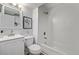 Basement bathroom with shower/tub and vanity at 16930 E Wagontrail Pkwy, Aurora, CO 80015