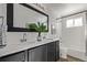 Modern bathroom with double vanity and a tub at 16930 E Wagontrail Pkwy, Aurora, CO 80015