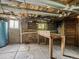 Unfinished basement space ready for customization with exposed ceiling and concrete walls at 6310 Tennyson St, Arvada, CO 80003