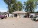 Detached garage offers parking and storage options on a gravel lot at 6310 Tennyson St, Arvada, CO 80003