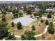 Aerial view of well-maintained tennis courts and scenic park with green space at 6310 Tennyson St, Arvada, CO 80003