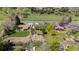 Aerial shot of neighborhood homes with cultivated garden plots and mature trees at 1322 Wicklow St, Boulder, CO 80303