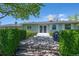 Lovely backyard patio with French doors, mature landscaping and privacy at 1322 Wicklow St, Boulder, CO 80303