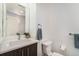 Modern bathroom with a sleek vanity, stylish faucet, and a well-lit mirror, perfect for a clean and contemporary look at 2726 Federal Blvd # 1, Denver, CO 80211