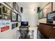 This home office, decorated with memorabilia, is equipped with a desk, chair, and speaker system for focused work at 2726 Federal Blvd # 1, Denver, CO 80211