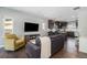 Inviting living room blends seamlessly into a modern kitchen, creating an open and airy living space at 2726 Federal Blvd # 1, Denver, CO 80211