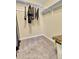 Walk-in closet with clothing rack and shelving at 17769 E Iowa Dr, Aurora, CO 80017