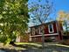 Charming home with mature trees and a well-maintained lawn at 17769 E Iowa Dr, Aurora, CO 80017