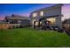 A large backyard with outdoor seating area and gazebo, perfect for entertaining at 16737 Lake Helen Blvd, Mead, CO 80542