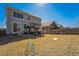 Spacious backyard featuring a patio, grill, gazebo, a small soccer net, and beautiful lawn at 16737 Lake Helen Blvd, Mead, CO 80542