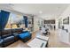 Spacious living room and dining area with hardwood floors, lots of natural light, open concept at 16737 Lake Helen Blvd, Mead, CO 80542
