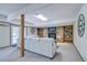 Finished basement with brick fireplace and shelving on either side, along with outside access at 19235 Wakonda Way, Monument, CO 80132