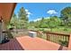 Wooden deck featuring a hot tub at 19235 Wakonda Way, Monument, CO 80132