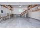 Spacious garage with built-in shelving for ample storage solutions at 19235 Wakonda Way, Monument, CO 80132