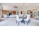 Open-concept living and dining area with adjacent kitchen, perfect for entertaining at 19235 Wakonda Way, Monument, CO 80132