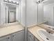 Bathroom with double sinks and a large mirror at 7440 Lowell Blvd # B, Westminster, CO 80030