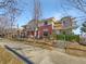 Attractive brick townhouse with a landscaped front yard and walkway at 7440 Lowell Blvd # B, Westminster, CO 80030