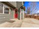 Back of house with a concrete patio, siding and a red door at 4630 E 135Th Way, Thornton, CO 80241