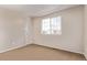 Bedroom with natural light with neutral color palette and cozy carpet at 4630 E 135Th Way, Thornton, CO 80241