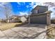 Charming two-story home with a well-maintained lawn and a gray two-car garage at 4630 E 135Th Way, Thornton, CO 80241