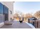 Deck with built-in fire pit and gas grill at 19805 E 58Th Pl, Aurora, CO 80019