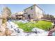 Large backyard with artificial turf and lighting at 19805 E 58Th Pl, Aurora, CO 80019