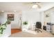 Bright home office features built-in desk and hardwood floors at 19805 E 58Th Pl, Aurora, CO 80019