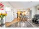 Kitchen and dining area with wood cabinets and table at 19805 E 58Th Pl, Aurora, CO 80019