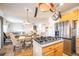 Open kitchen with breakfast bar, stainless steel appliances and view of living room at 19805 E 58Th Pl, Aurora, CO 80019