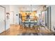 Eat-in kitchen with light wood cabinets and sliding door at 19805 E 58Th Pl, Aurora, CO 80019