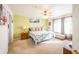 Large main bedroom with king-size bed and ensuite bathroom at 19805 E 58Th Pl, Aurora, CO 80019