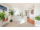Spacious upper hallway with natural light and plants at 19805 E 58Th Pl, Aurora, CO 80019