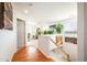 Upstairs hallway with wood floors and access to bedrooms at 19805 E 58Th Pl, Aurora, CO 80019