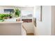 Upstairs hallway with decorative wall art and plants at 19805 E 58Th Pl, Aurora, CO 80019