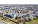 Aerial view showcasing a community and highlighting the home and backyard at 5171 E 119Th Ct, Thornton, CO 80233