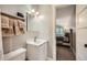 Bright renovated bathroom with towel rack and view into the main bedroom at 815 Columbine Rd # 22, Breckenridge, CO 80424