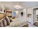 Bedroom featuring a rustic bunk bed, queen bed, built-in cabinets and outdoor access at 815 Columbine Rd # 22, Breckenridge, CO 80424