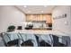 Efficient kitchen bar seating, updated cabinets, modern appliances, and subway tile backsplash at 815 Columbine Rd # 22, Breckenridge, CO 80424