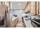 Bright kitchen featuring stainless steel appliances, granite countertops, and ample storage space at 815 Columbine Rd # 22, Breckenridge, CO 80424
