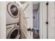 Convenient laundry area features a stacked washer and dryer at 815 Columbine Rd # 22, Breckenridge, CO 80424
