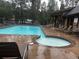 Community pool with lounge chairs and a hot tub at 815 Columbine Rd # 22, Breckenridge, CO 80424