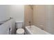 Clean and well-maintained bathroom with a shower-tub combination and tiled walls at 4203 Owens St, Wheat Ridge, CO 80033