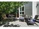 Inviting back deck featuring outdoor seating, perfect for relaxing and enjoying the serene backyard at 6401 S Forest St, Centennial, CO 80121